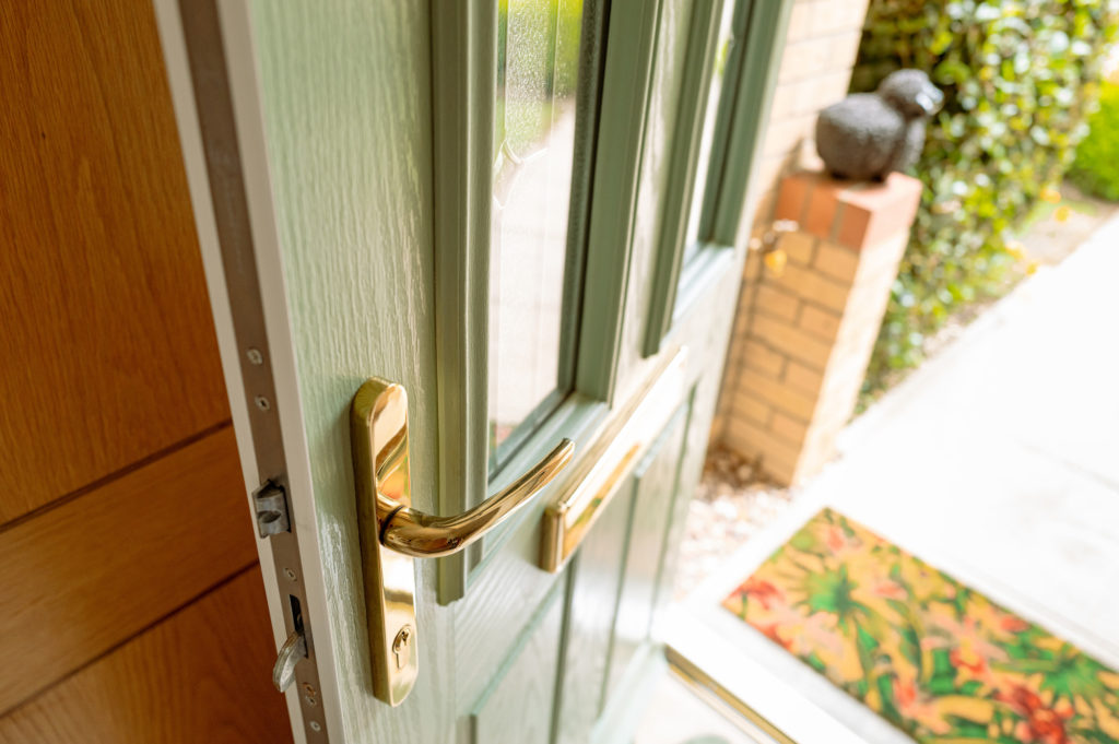 Green uPVC front door in Surrey.